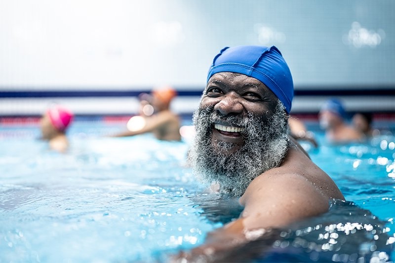 Man swimming with dentures